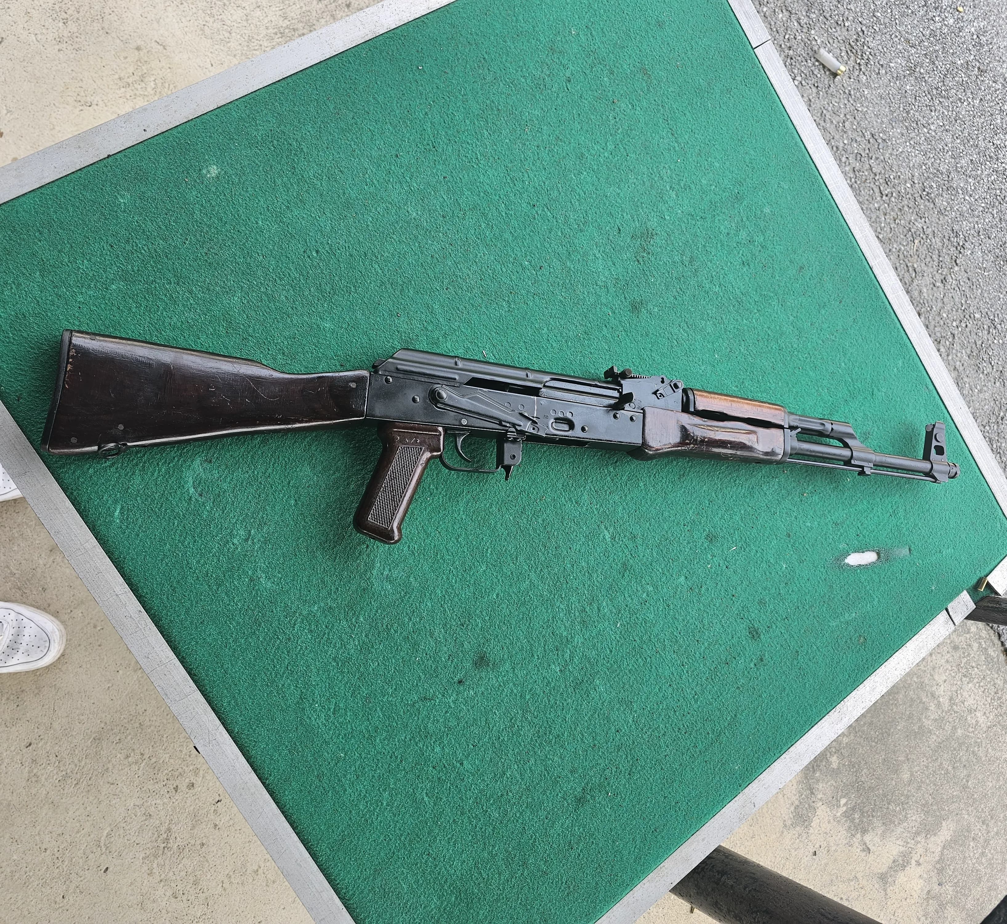An AK-47 style rifle or 7.62x39mm ammunition